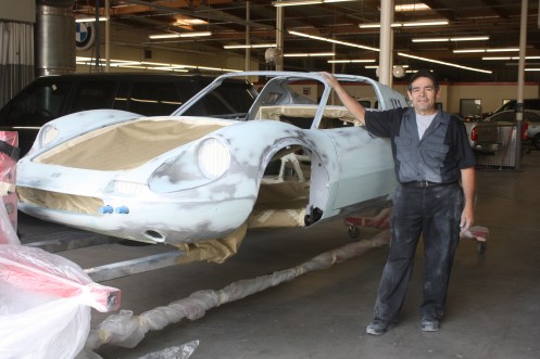 Mike Helping To Move The Dino Into The Spray Booth